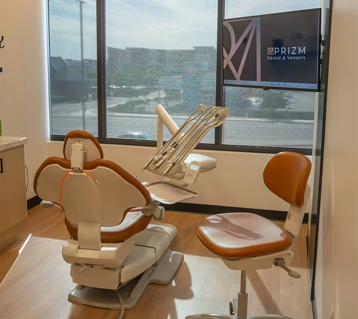 A member of Prizm Dental team smiling